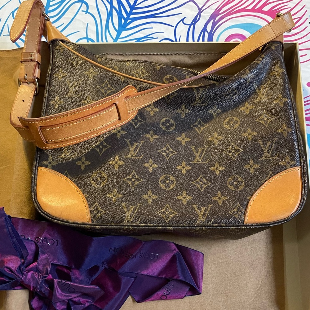 Classic Louis Vuitton Boulogne bag in the iconic Monogram pattern.